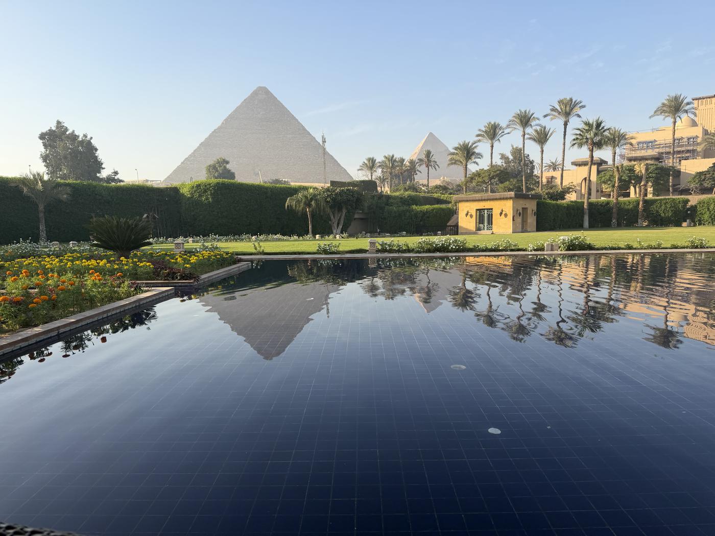 the pyramid mirrored in the pool